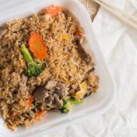 Spicy Fried Rice · Jasmine rice pan-fried with fresh chili, garlic, sweet onions, broccoli, carrot, eggs and Th...