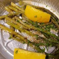 Grilled Asparagus · With lemon and garlic.