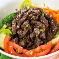 Bulgogi Korean Steak Bowl · (618 cal, 20 gm fat, 72 carbs, 38gm protein) Marinated steak, brown rice, cabbage slaw, gree...