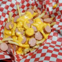 Salchipapas / Slice Sausage With Fries · Papas fritas con salchicha picada y queso amarillo / French fries with chopped hot dog
weine...