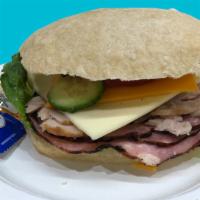 Ciabatta Sandwich · Hungry for lunch? Here's a great sandwich option:
Ciabatta, with ham and turkey, sharp chedd...