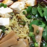 Tofu Ramen · Egg noodle, tofu, spinach, lettuce, bamboo, in a soy sauce broth.