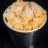 Sam'S Buffalo Mac N' Cheese · Macaroni in a 3 cheese blend sauce, topped with parmesan and our spicy buffalo sauce.