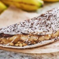 Banana Crepes (Cal 260) · Caramelized banana with a drizzle of cinnamon, organic raw sugar, topped with mixed nuts, co...