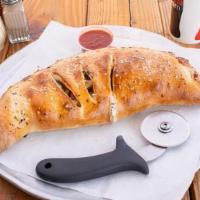 Big Ass Calzone · Stuffed with Ricotta and Mozzarella. Make it your own with customizable Topping Stuffers!