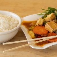 Sweet& Sour Tofu · Tofu, broccoli, bell peppers, celery, onions, carrots and cucumber in a sweet and sour sauce.