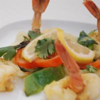 Shrimp Sauteed       (Dairy & Gluten Free) · Black tiger shrimp rubbed with lemon spice mix & sauteed with curry leaves, fresh onion and ...