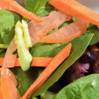 Tossed Salad · Mixed greens, carrots, cucumber, tomatoes, goat cheese, croutons and dressed with our basil ...