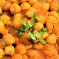 Channa Masala      (Vegan & Gluten Free) · Garbanzo beans, fresh garlic, red chili powder, tomatoes.