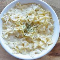 Alfredo · Parmigiano-Reggiano cream sauce and bowtie pasta .