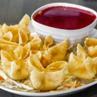 Crab Rangoons (8) · Crispy hand-folded wonton wrappers filled with crab, cream cheese, and scallions. Served wit...