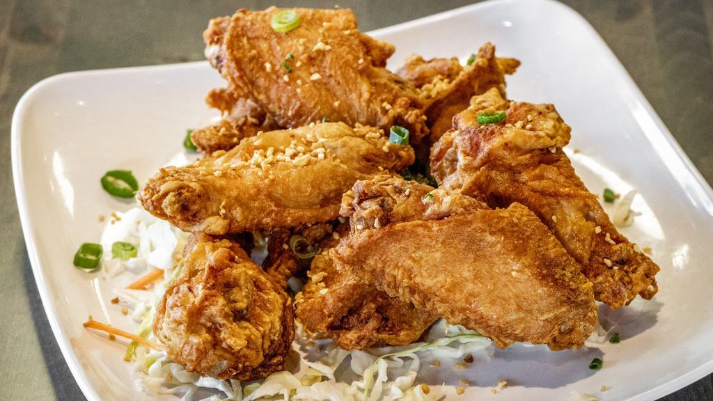 Marinated Fried Chicken Wings · Spicy. Crispy golden brown chicken wings with choices of spicy, garlic, or salt and pepper.