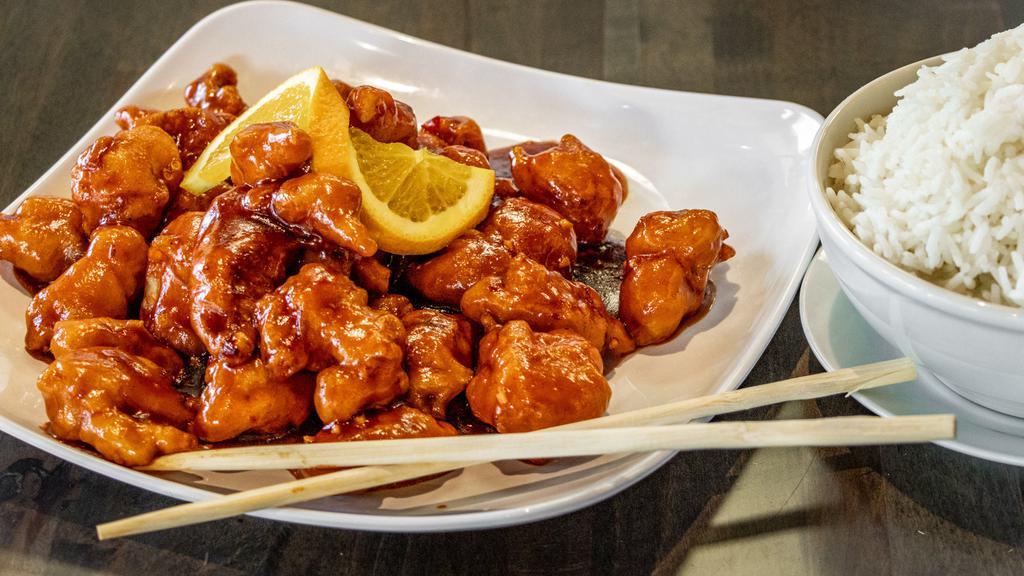 Orange Chicken · Spicy. Crispy chicken tossed in a sweet and spicy orange sauce with chili peppers.