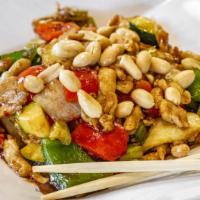 Kung Pao Chicken · Spicy. A Sichuan-inspired dish with stir-fried chicken, peanuts, celery, baby corn, zucchini...