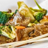 Beef With Broccoli · Savory garlic brown sauce with stir-fried beef or shrimp, broccoli, and carrots.