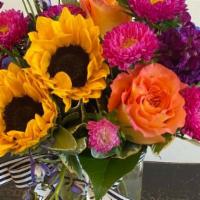 Don’T Worry, Be Happy! · A fun and bright arrangement that is sure to cheer someone up!