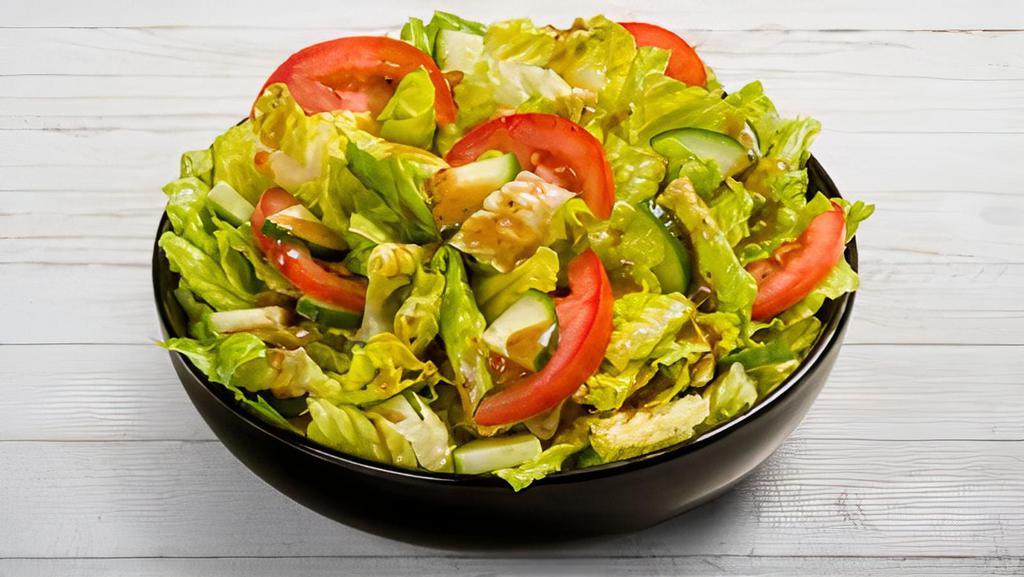 Garden · Romaine topped with Tomatoes, Cucumbers, and Dressing