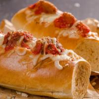 The Amazing Meatball Sub · Three of our delicious meatballs covered in homemade marinara sauce, topped with melted mozz...