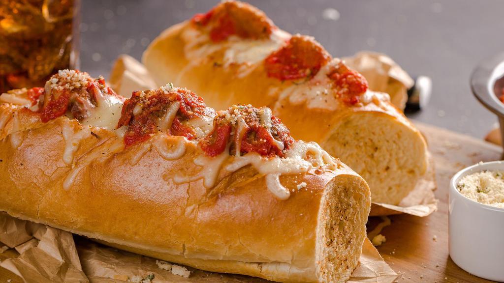 The Amazing Meatball Sub · Three of our delicious meatballs covered in homemade marinara sauce, topped with melted mozzarella, provolone  and italian seasoning.