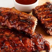 Louis Ribs Party Platter · Three 1/2 racks of St. Louis Ribs. Smoked, grilled and brushed with a tangy BBQ sauce. Serve...