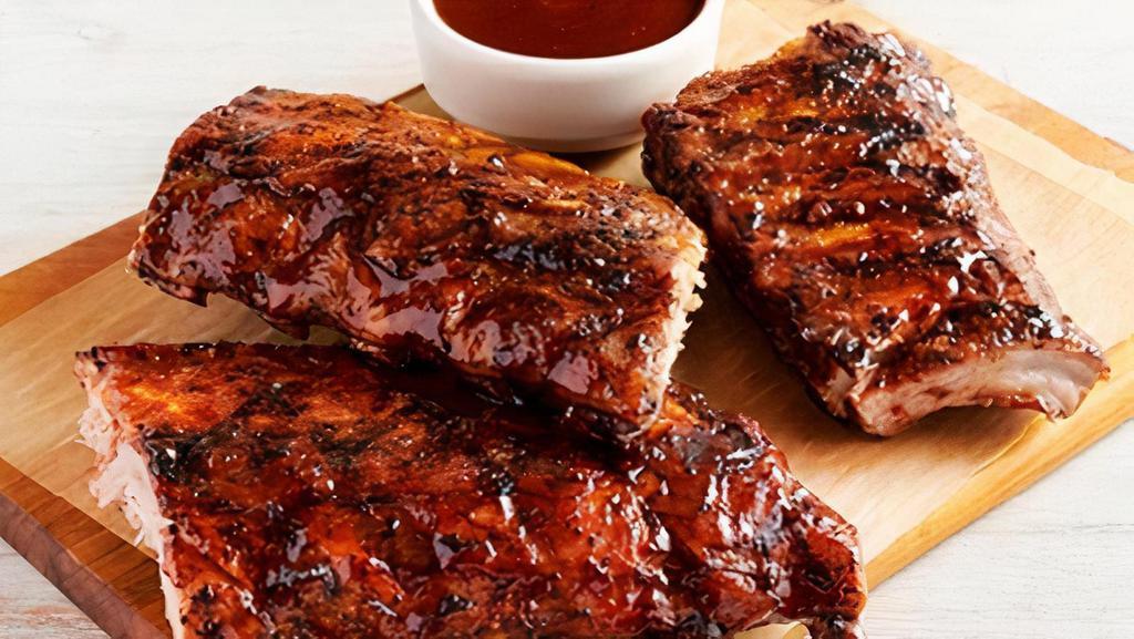 Louis Ribs Party Platter · Three 1/2 racks of St. Louis Ribs. Smoked, grilled and brushed with a tangy BBQ sauce. Serves 4 - 6.
