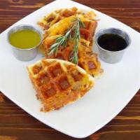 Bacon-Cheddar Waffles · Bacon-Cheddar Waffles, smothered in melted butter with rosemary infused maple syrup. Weekend...