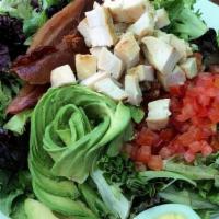 The Chop Salad · Chicken or Tuna, Greens, Avocado, Tomato, Egg, Bacon + Bleu Cheese Dressing