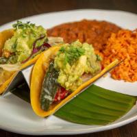 2 Veggie Delight Tacos · Grilled Fajita Style Vegetables, Corn Tortillas, Grilled Corn, Potatoes, Mexican Cheese Blen...