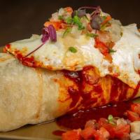 Breakfast Burrito · Flour Tortilla, Diced Potatoes, Chorizo, Mexican Cheese Blend, Refried Beans, Traditional Re...