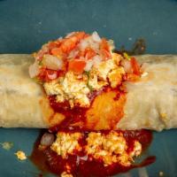 Vegan Breakfast Burrito · Flour Tortilla, Diced Potatoes, Vegan Chorizo, Vegan Cheese, Refried Beans, Traditional Red ...