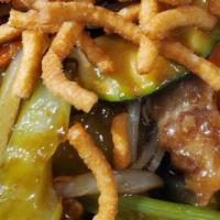 Chow Mein · HARD & CRUNCHY noodles top this stir-fry of celery, yellow onions, zucchini, carrots, and be...