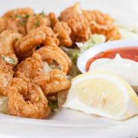 Crisp Calamari · Calamari rings, hand breaded and fried. Served on a bed of lettuce with sweet chili sauce an...