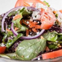 Mediterranean Salad · Fresh field greens tossed with tomatoes, red onion, kalamata olives, cucumbers, feta cheese,...