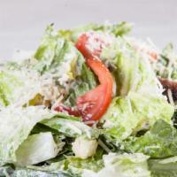 Caesar Salad · Fresh romaine lettuce tossed with Parmesan cheese, garlic croutons, and traditional caesar d...