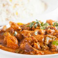 Jalfrazie · A rich brown curry with bell peppers, garlic, ginger, tomatoes, and onions.