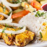 Tandoori Chicken Tikka Breast · Juicy spring boneles chicken breast rubbed with Indian herbs, yogurt, spices, and saffron. S...