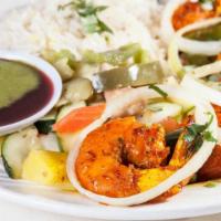 Tandoori Prawns · Jumbo prawns marinated in a special blend of spices and herbs then roasted in the tandoor. S...
