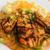 Blackened Chicken & Cheese Grits · Cajun seasoned chicken breasts with sautéed bell pepper, mushroom, onion and tomato in Cajun...