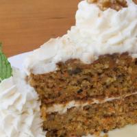 Carrot Cake · Cream cheese frosting, toasted Coconut & walnuts, crème Anglaise