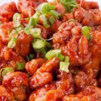 Orange Chicken · Tender crispy chicken glazed with a sweet tangy orange sauce. Served with steamed white rice.