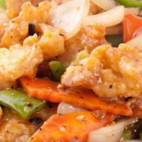 Fish Fillet With Black Bean Sauce · Tender sole fish fillet with diced bell pepper, onions, carrots stir fried in a black bean s...