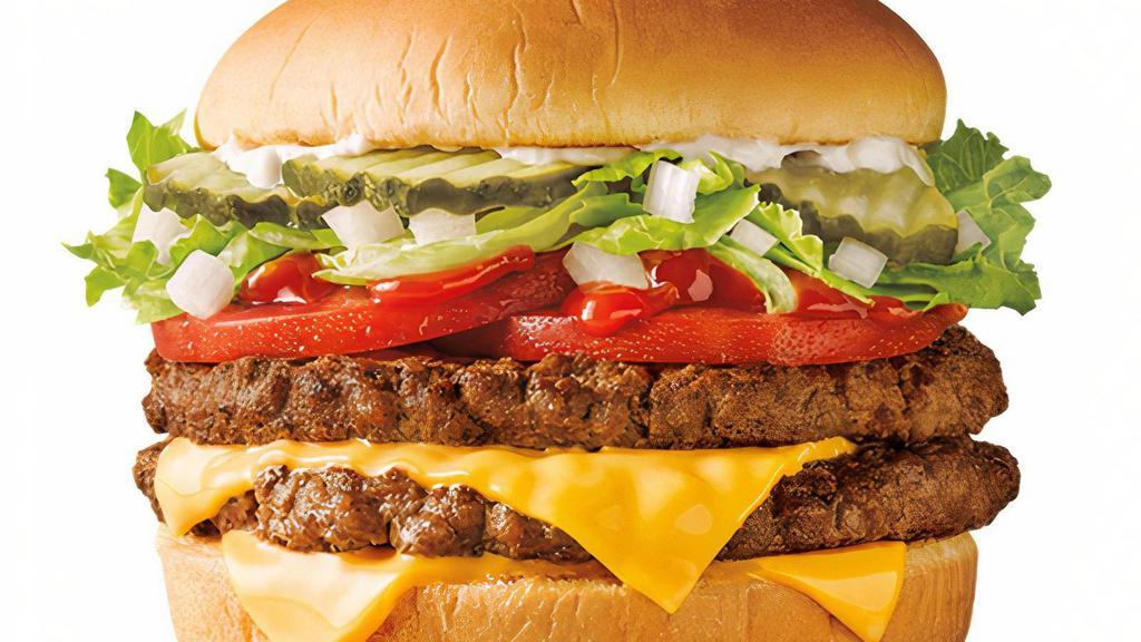 Supersonic® Double Cheeseburger · Double the SONIC® goodness with the SuperSONIC® Cheeseburger. Two juicy, perfectly seasoned, quarter pound, 100% pure beef patties that are layered with two slices of melty American cheese, crisp, crinkle cut pickles, tangy ketchup, diced onions, creamy mayo, crisp lettuce, and hand sliced tomatoes on a golden, toasted bun. Seeing double has never been tastier.