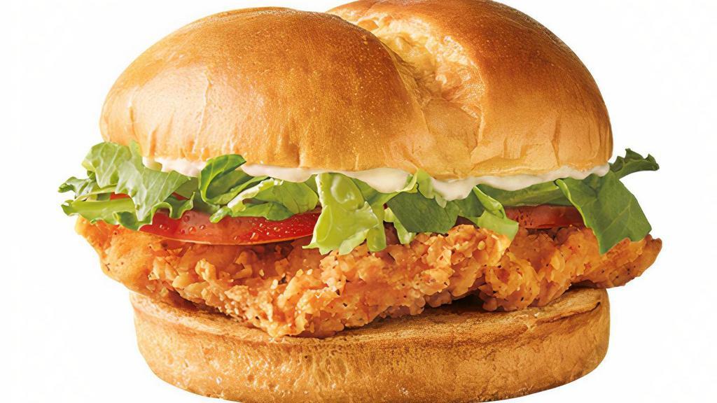Classic Crispy Chicken Sandwich · Lightly seasoned and breaded 100% all white meat chicken breast topped with fresh lettuce, ripe tomatoes and your choice of mustard, mayo or ketchup, served on a warm Brioche bun.