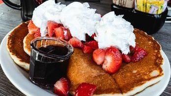 Pancake With Berries · Buttermilk pancakes, strawberries or five-berry mix, whipped cream