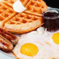 Belgian Waffle Combo · Choice of waffle served with two eggs & your choice of ham, bacon or sausage.