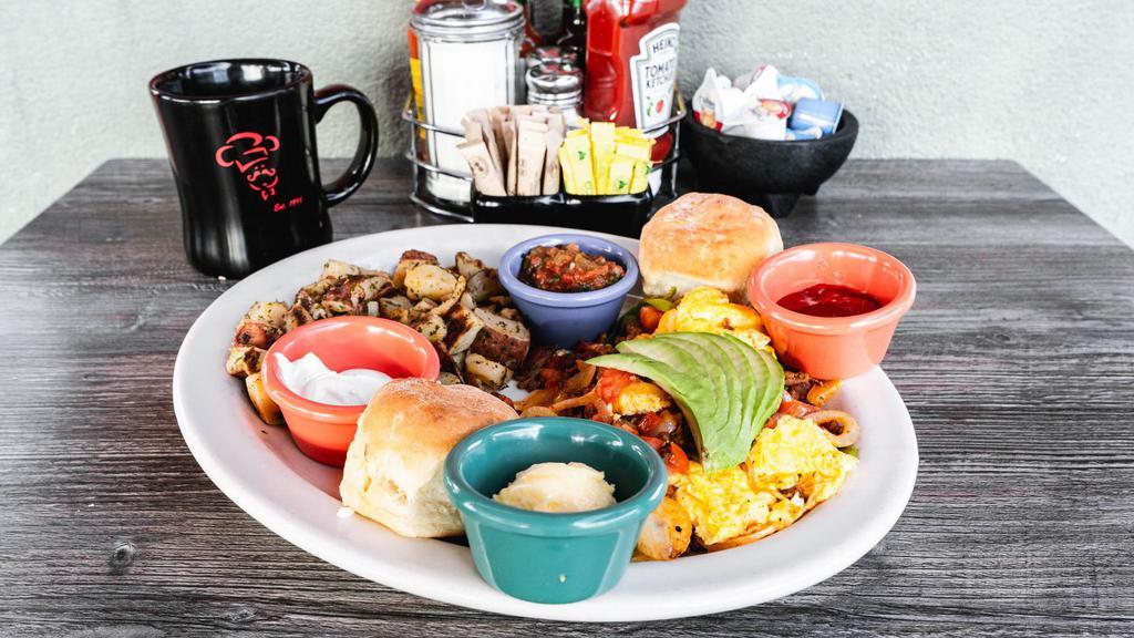 Southwest Delight · Three scrambled eggs, spicy chorizo sausage, bell peppers, onions & tomatoes with sour cream & avocado slices. Served with salsa.