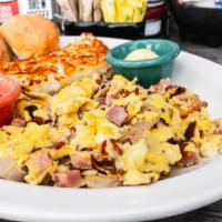 Meat Lovers · Three scrambled eggs loaded with ham, bacon & sausage.
