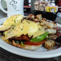 E.A.S.T. Benedict · Grilled English muffin topped with bacon, eggs, avocado, spinach, tomato & hollandaise sauce.