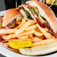 California Club · Thin sliced turkey, crisp bacon, fresh lettuce, sliced tomato, avocado slices, mayonnaise & ...