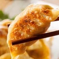 Pot--Stickers (6 Pcs.) · Fried dumpling with pork and vegetables.